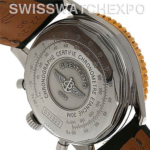The image shows the back case of a Breitling Navitimer D22322 Men
s Stainless Steel White Dial D22322 Men
s Stainless Steel White Dial watch, highlighting the engravings and certification information around the case.