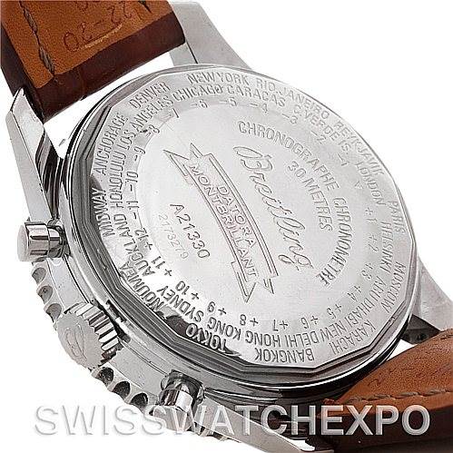 This image shows the back case and part of the leather strap of a Breitling Navitimer A21330 Men
s Stainless Steel Beige Dial A21330 Men
s Stainless Steel Beige Dial watch, displaying engravings and the model
s details.