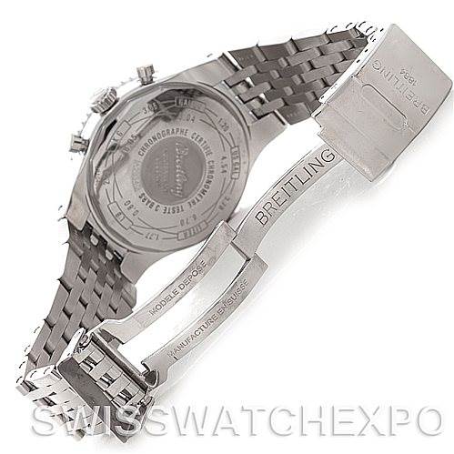 The image shows the back view and open clasp of a Breitling Navitimer A23340 Men's Stainless Steel White Dial A23340 Men's Stainless Steel White Dial watch, highlighting its stainless steel bracelet and engraved case back.