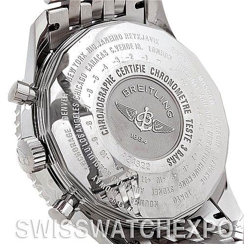 The image shows the back case and part of the bracelet of a Breitling Navitimer A24322 Men's Stainless Steel White Dial A24322 Men's Stainless Steel White Dial watch, highlighting the engraving and certifications.