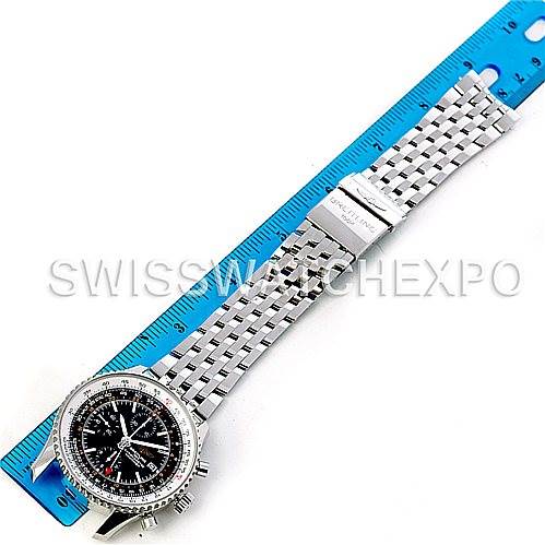 The Breitling Navitimer A24322 Men's Stainless Steel Black Dial A24322 Men's Stainless Steel Black Dial watch is shown from a top-down angle, displaying its dial, bezel, case, and metal bracelet fully extended alongside a ruler.