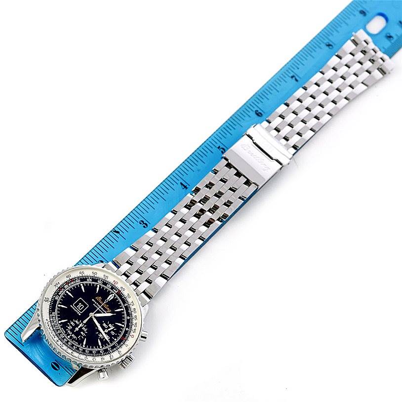 The Breitling Navitimer A36030 Men's Stainless Steel Black Dial A36030 Men's Stainless Steel Black Dial watch is shown fully extended with a close-up of its face and metal bracelet, measured against a ruler.