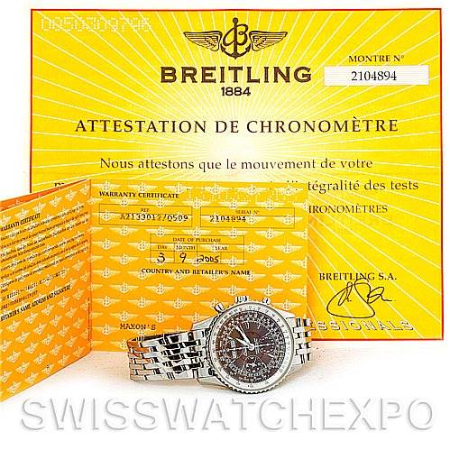 The image shows a Breitling Navitimer A21330 Men
s Stainless Steel Brown Dial A21330 Men
s Stainless Steel Brown Dial watch lying flat, accompanied by its warranty certificate and chronometer attestation.