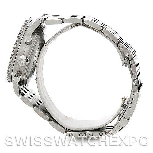 This image shows a Breitling Navitimer A41322 Men's Stainless Steel Silver Dial A41322 Men's Stainless Steel Silver Dial watch from a side angle, highlighting the case, bezel, crown, and bracelet.