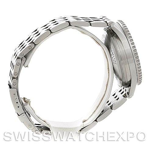 The image shows a side view of a Breitling Navitimer A41322 Men's Stainless Steel Silver Dial A41322 Men's Stainless Steel Silver Dial watch, highlighting its metal bracelet, case, and lugs.