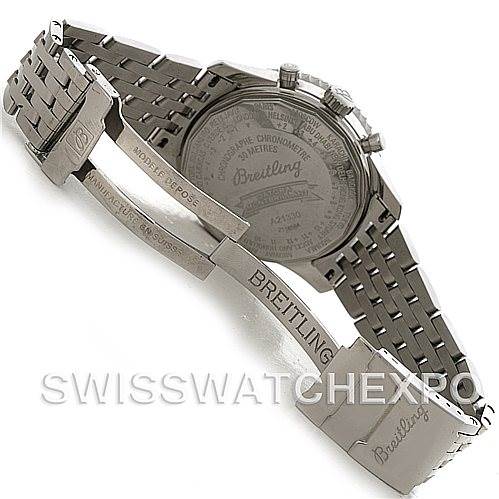 The image shows the back case and clasp of a Breitling Navitimer A21330 Men's Stainless Steel Beige Dial A21330 Men's Stainless Steel Beige Dial watch, displaying its metal bracelet and engraved details.