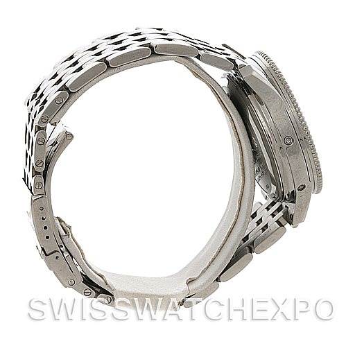 The image shows a side view of a Breitling Navitimer A19350 Men
s Stainless Steel Silver Dial A19350 Men
s Stainless Steel Silver Dial watch, focusing on the metal bracelet and the case.