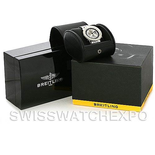The image shows a Breitling Navitimer A19350 Men
s Stainless Steel Silver Dial A19350 Men
s Stainless Steel Silver Dial watch on a stand with its packaging boxes, viewed from a slightly elevated front angle.