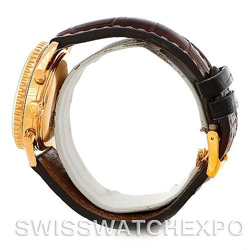 The image shows a side view of a Breitling Navitimer H41330 Men's Rose Gold Silver Dial H41330 Men's Rose Gold Silver Dial watch, highlighting the case, crown, and leather strap.