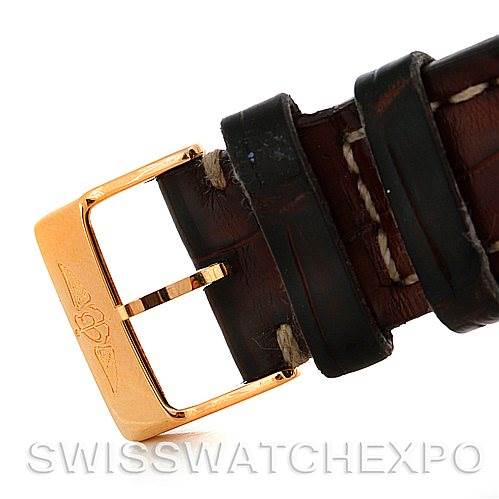 This image shows the buckle and leather strap of a Breitling Navitimer H41330 Men's Rose Gold Silver Dial H41330 Men's Rose Gold Silver Dial watch, highlighting the gold buckle clasp.