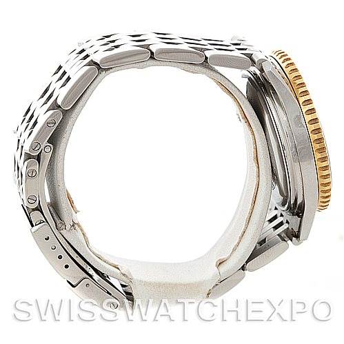 Side view of a Breitling Navitimer D30022 Men's Stainless Steel Black Dial D30022 Men's Stainless Steel Black Dial watch, showing the bracelet, clasp, and part of the watch case with a gold bezel.