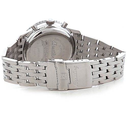 The image shows the back case and metal bracelet of a Breitling Navitimer A41330 Stainless Steel Black Dial A41330 Stainless Steel Black Dial watch, focusing on the clasp and engraved logo.