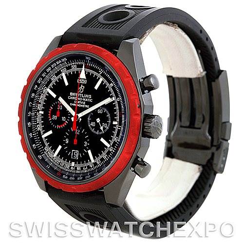 The image shows a Breitling Navitimer M14360 Men's Stainless Steel Black Dial M14360 Men's Stainless Steel Black Dial watch from a three-quarter angle, highlighting its black dial, red bezel, chronograph dials, and rubber strap.
