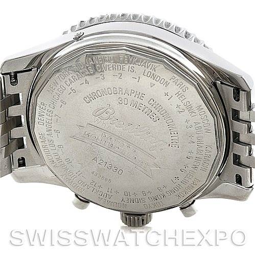 The image shows the back case of a Breitling Navitimer A21330 Men
s Stainless Steel Beige Dial A21330 Men
s Stainless Steel Beige Dial watch, displaying the engraved details, serial number, and part of the metal bracelet.