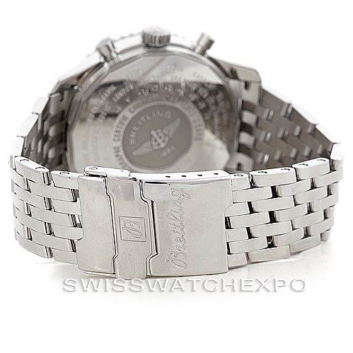 The image shows the Breitling Navitimer A24322 Men
s Stainless Steel White Dial A24322 Men
s Stainless Steel White Dial watch from the back, highlighting its stainless steel bracelet and engraved clasp.