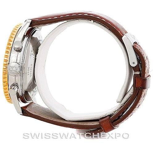 Side view of the Breitling Navitimer D13022 Men's Stainless Steel White Dial D13022 Men's Stainless Steel White Dial watch, showing the leather strap and part of the bezel.