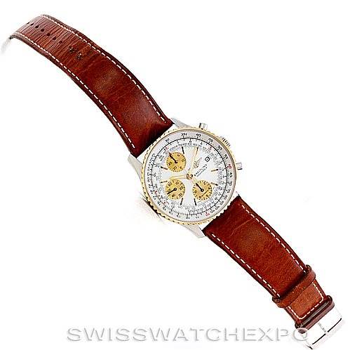 The image shows a top-down view of a Breitling Navitimer D13022 Men's Stainless Steel White Dial D13022 Men's Stainless Steel White Dial watch, showcasing the brown leather strap and the detailed dial.