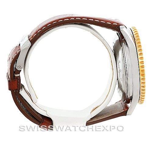 The image shows a side view of a Breitling Navitimer D13022 Men's Stainless Steel White Dial D13022 Men's Stainless Steel White Dial watch with brown leather straps and a yellow bezel.