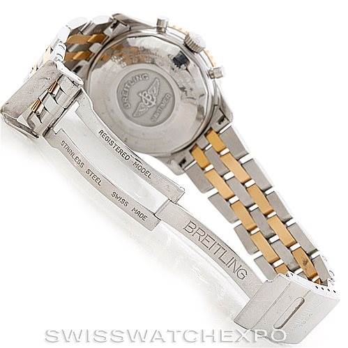 The image shows the open stainless steel clasp and back case of a Breitling Navitimer D13020 Men's Stainless Steel Black Dial D13020 Men's Stainless Steel Black Dial watch, with parts of the bracelet visible.