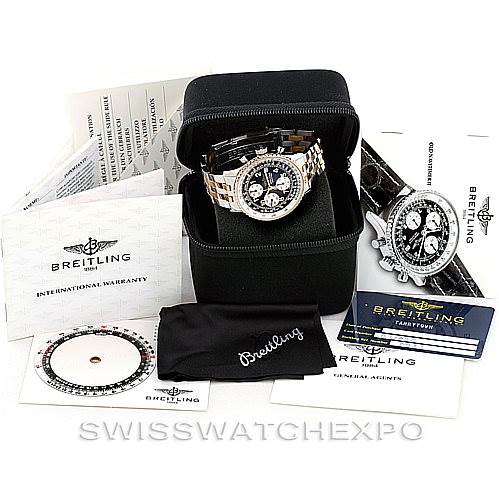 The image shows a Breitling Navitimer D13020 Men's Stainless Steel Black Dial D13020 Men's Stainless Steel Black Dial watch in a case, along with warranty cards, manuals, and a cleaning cloth.