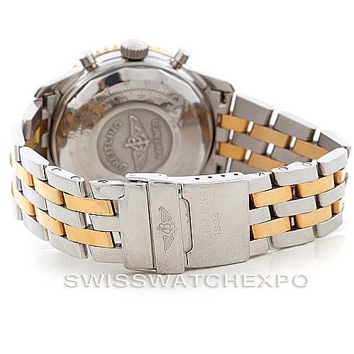 The image shows the back view of a Breitling Navitimer D13020 Men's Stainless Steel Black Dial D13020 Men's Stainless Steel Black Dial watch with a two-tone stainless steel and gold bracelet.