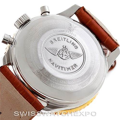 This image shows the back case and part of the leather strap of a Breitling Navitimer B13019 Men's Stainless Steel Silver Dial B13019 Men's Stainless Steel Silver Dial watch at a slight angle.