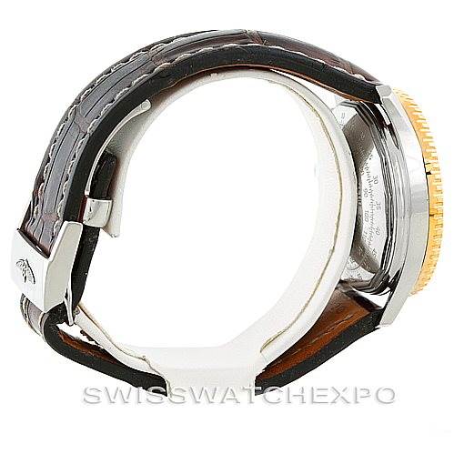 Side view of a Breitling Navitimer D23322 Men's Stainless Steel Silver Dial D23322 Men's Stainless Steel Silver Dial, showing the strap, clasp, case back, and part of the bezel.