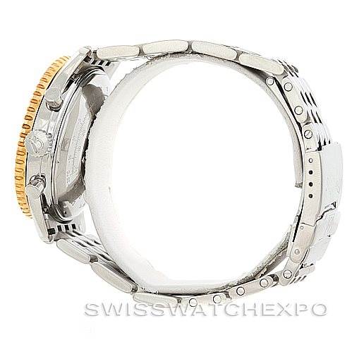 This side view shows the case, crown, bezel, and bracelet of the Breitling Navitimer D13022 Men
s Stainless Steel Blue Dial D13022 Men
s Stainless Steel Blue Dial watch.