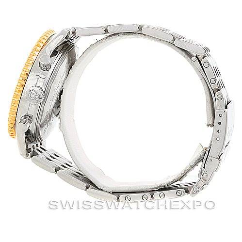 Side view of the Breitling Navitimer D22322 Men's Stainless Steel Silver Dial D22322 Men's Stainless Steel Silver Dial watch, showcasing the metal bracelet and golden bezel.