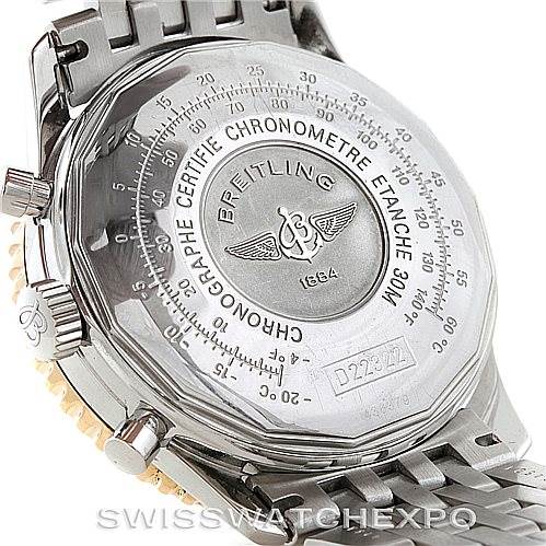 The image shows the back case and part of the bracelet of the Breitling Navitimer D22322 Men's Stainless Steel Silver Dial D22322 Men's Stainless Steel Silver Dial watch, highlighting the manufacturer's engravings.
