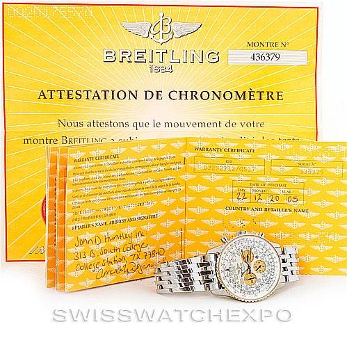 The image shows a Breitling Navitimer D22322 Men's Stainless Steel Silver Dial D22322 Men's Stainless Steel Silver Dial watch displayed in front of its chronometer certification and warranty documents.
