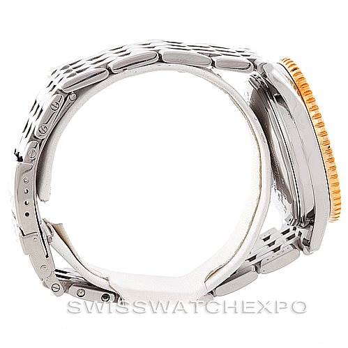 The image shows a side view of a Breitling Navitimer D22322 Men's Stainless Steel Silver Dial D22322 Men's Stainless Steel Silver Dial watch, highlighting the band, case, and bezel.