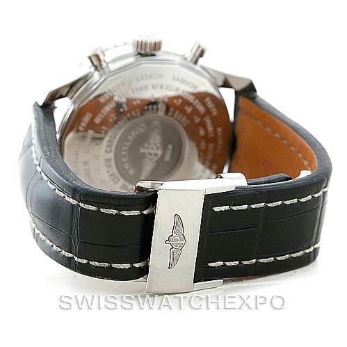 The image shows the back of a Breitling Navitimer A24322 Men
s Stainless Steel Black Dial A24322 Men
s Stainless Steel Black Dial watch, focusing on the back case and leather strap with a metal clasp.
