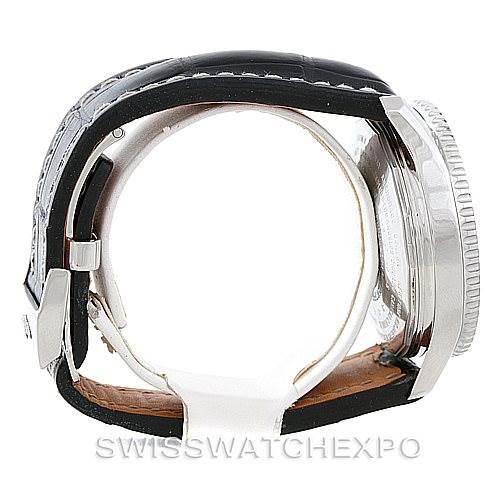 The image shows a side view of a Breitling Navitimer A24322 Men
s Stainless Steel Black Dial A24322 Men
s Stainless Steel Black Dial watch, focusing on the case, bezel, and leather strap.