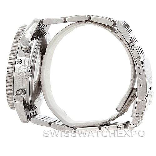 This image shows a Breitling Navitimer A19340 Men's Stainless Steel Blue Dial A19340 Men's Stainless Steel Blue Dial watch from a side view, highlighting its crown, pushers, and metal bracelet.