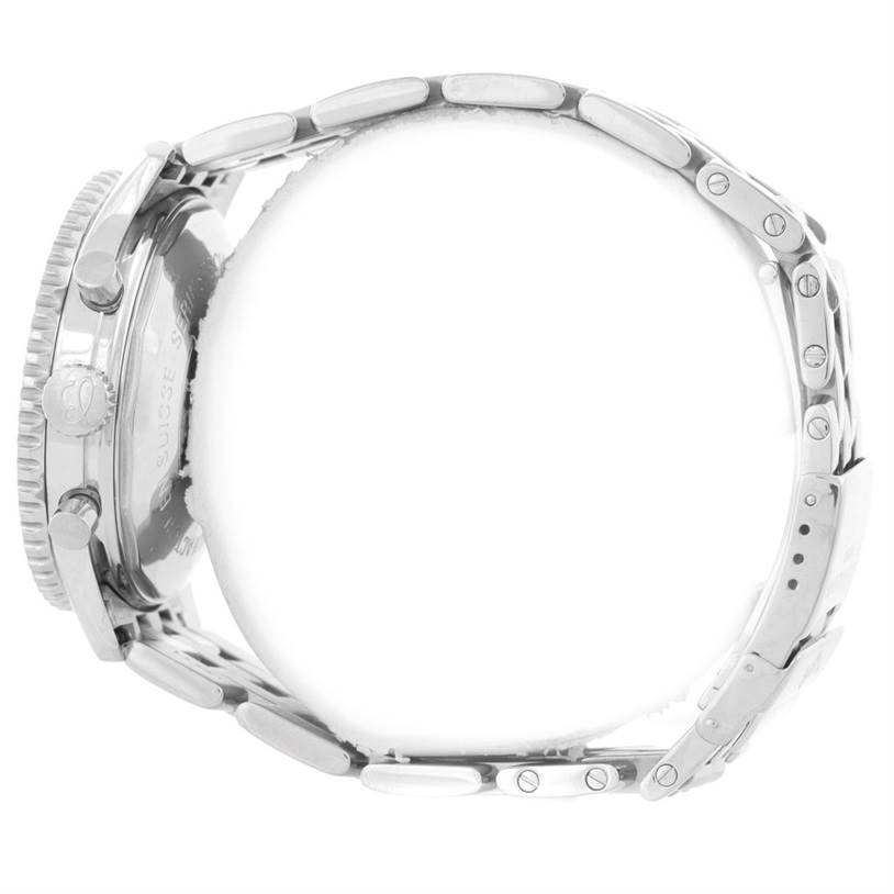 This image shows a side view of the Breitling Navitimer A13022 Men
s Stainless Steel Black Dial A13022 Men
s Stainless Steel Black Dial watch, highlighting its case, crown, and metal bracelet.