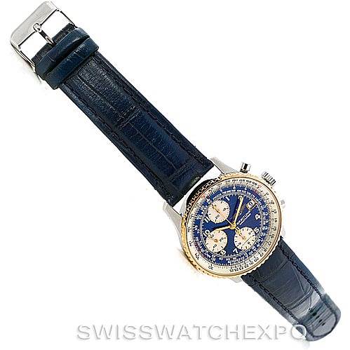The image shows a top view of a Breitling Navitimer D13022 Men's Stainless Steel Blue Dial D13022 Men's Stainless Steel Blue Dial watch with a blue leather strap and gold and silver casing.