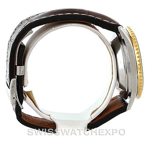 The image shows a side view of a Breitling Navitimer 81600 Men
s Stainless Steel Black Dial 81600 Men
s Stainless Steel Black Dial watch, highlighting the leather strap and bezel.