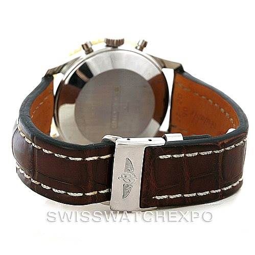 The image shows the back of a Breitling Navitimer 81600 Men
s Stainless Steel Black Dial 81600 Men
s Stainless Steel Black Dial watch, focusing on its brown leather strap and clasp with the Breitling logo.