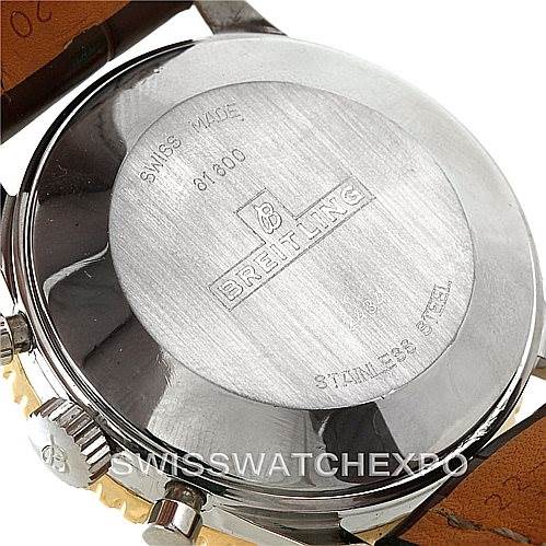 The image shows the back case and part of the strap of a Breitling Navitimer 81600 Men
s Stainless Steel Black Dial 81600 Men
s Stainless Steel Black Dial watch, highlighting the engraved brand and model details.
