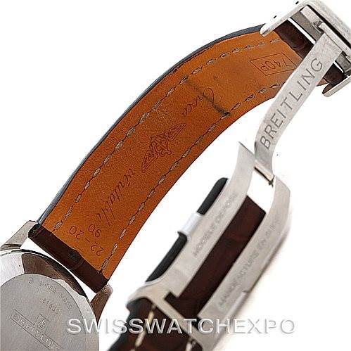 This image shows the backside of a Breitling Navitimer 81600 Men
s Stainless Steel Black Dial 81600 Men
s Stainless Steel Black Dial watch focusing on the leather strap and deployment clasp.