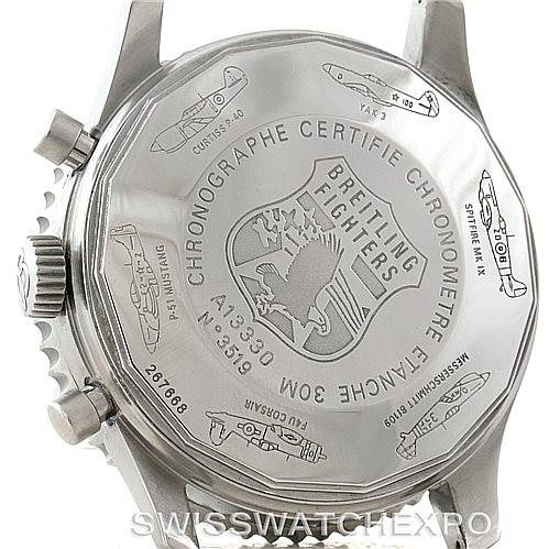 The image shows the back case of a Breitling Navitimer A13330 Men's Stainless Steel Black Dial A13330 Men's Stainless Steel Black Dial watch, showcasing engraved details and the brand's emblem.