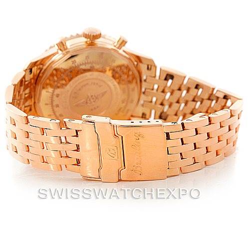 The image shows the back and bracelet of a Breitling Navitimer R23322 Men's Rose Gold Black Dial R23322 Men's Rose Gold Black Dial watch, highlighting the clasp and part of the case.