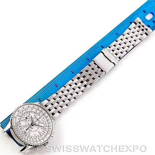 The Breitling Navitimer A21330 Men's Stainless Steel Silver Dial A21330 Men's Stainless Steel Silver Dial watch is shown flat with the face, bracelet, and a blue ruler for scale.