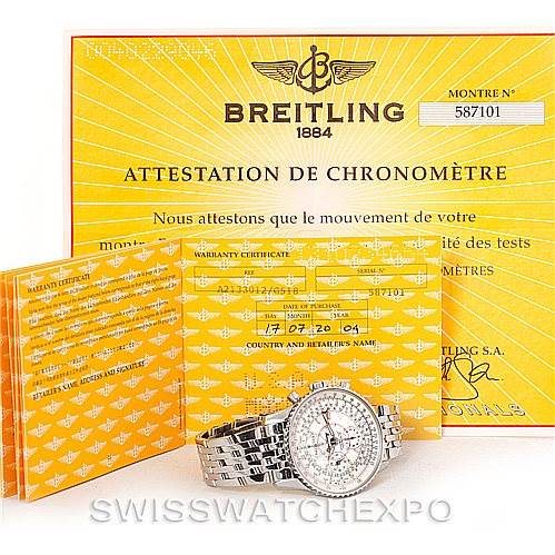 The image shows a Breitling Navitimer A21330 Men's Stainless Steel Silver Dial A21330 Men's Stainless Steel Silver Dial watch with its stainless steel bracelet alongside the warranty certificate and chronometer attestation.