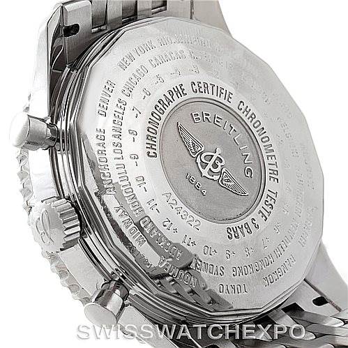 The image shows the back and side view of the Navitimer model by Breitling, including the watch's case back and part of its bracelet.