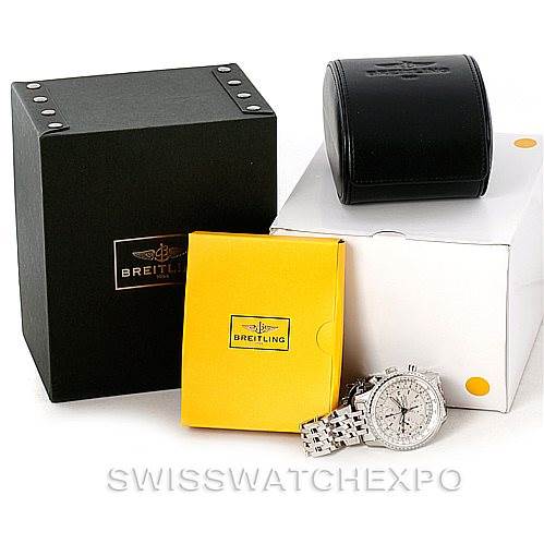 The image shows a Breitling Navitimer A24322 Men's Stainless Steel White Dial A24322 Men's Stainless Steel White Dial watch displayed with its boxes and a leather case, viewed from an angled perspective.