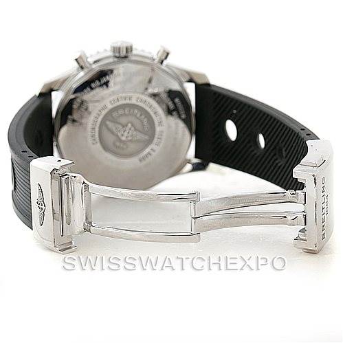 The image shows the back view of a Breitling Navitimer A24322 Men
s Stainless Steel Black Dial A24322 Men
s Stainless Steel Black Dial watch with an open clasp and a black perforated strap.