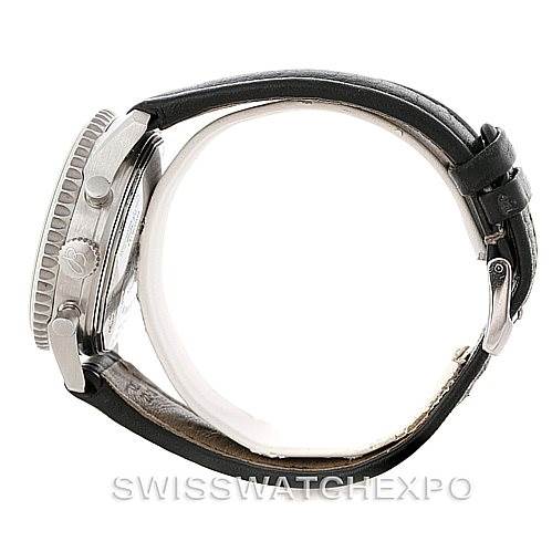 This side view of the Breitling Navitimer A13330 Men's Stainless Steel Silver Dial A13330 Men's Stainless Steel Silver Dial watch shows its case, crown, pushers, and black leather strap.