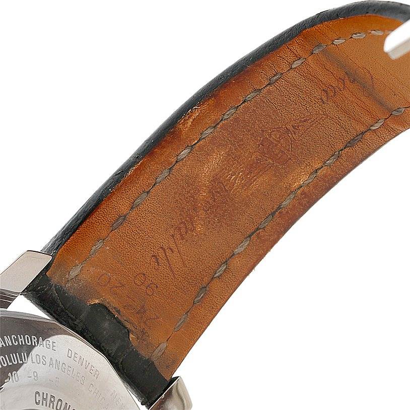 The image shows the underside of the leather strap and part of the back case of a Breitling Navitimer A24322 Men's Stainless Steel Black Dial A24322 Men's Stainless Steel Black Dial model watch.